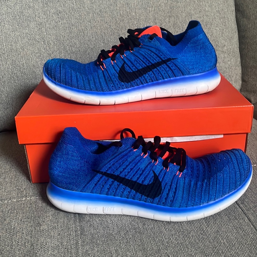 Nike free’s orange, and blue color way